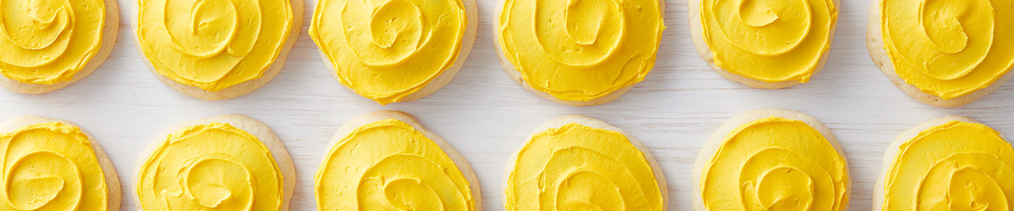 yellow frosted cookies